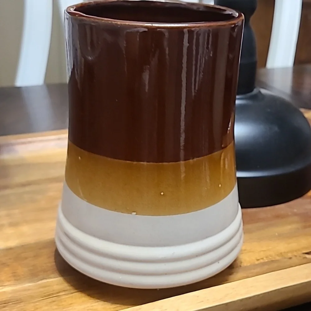 Vintage kitchen utensils holder.